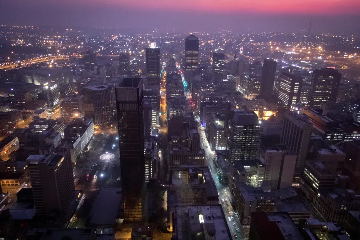The dense inner city of Johannesburg seen from above, high-rises running to the horizon