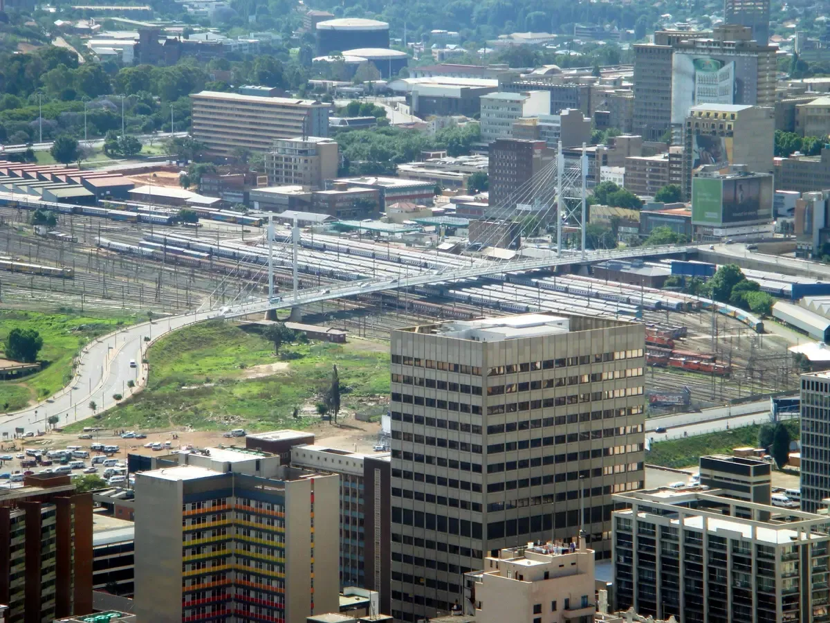 The Nelson Mandela Bridge spanning between Braamfontein and Newtown against the city skyline