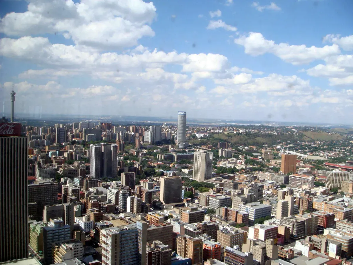 Ponte City tower at the centre of the Johannesburg skyline, seen from the Top of Africa viewing deck of the Carlton Centre